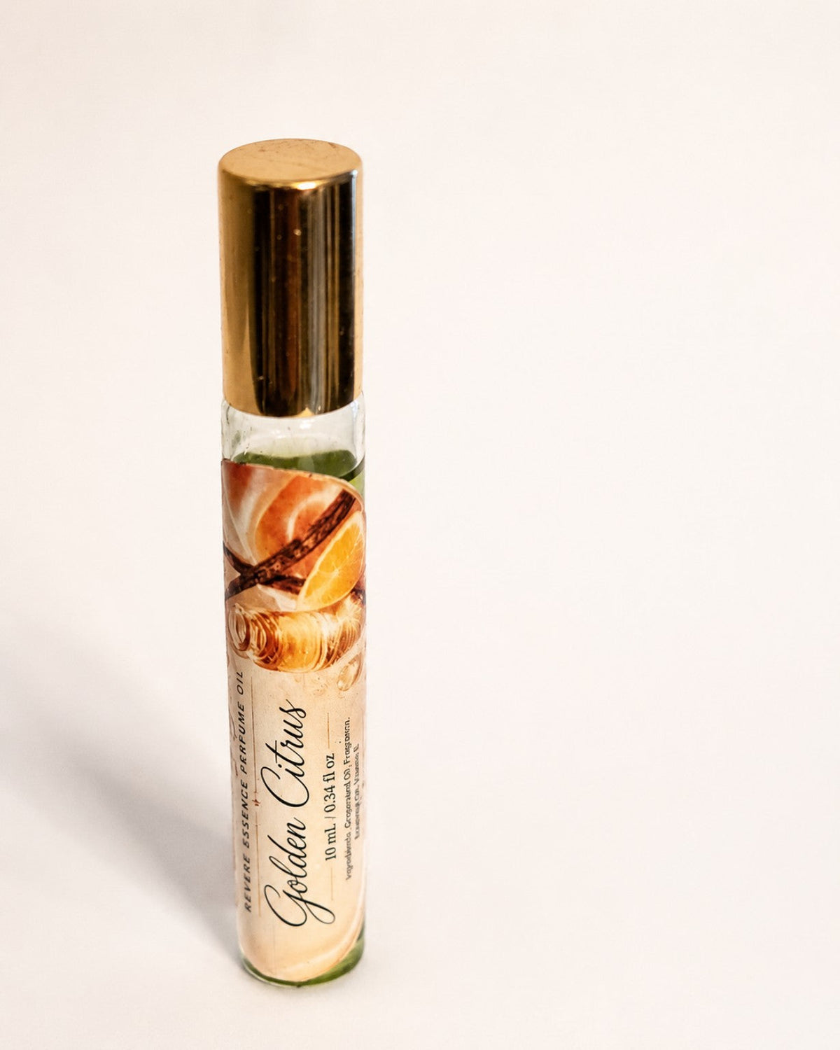 Revere Essence Golden Citrus 10 mL perfume oil roller by Essentially Yours, vertical product photo